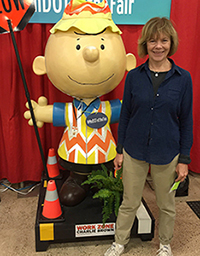 Photo of Lt. Gov. Tina Smith at MnDOT booth at the State Fair.
